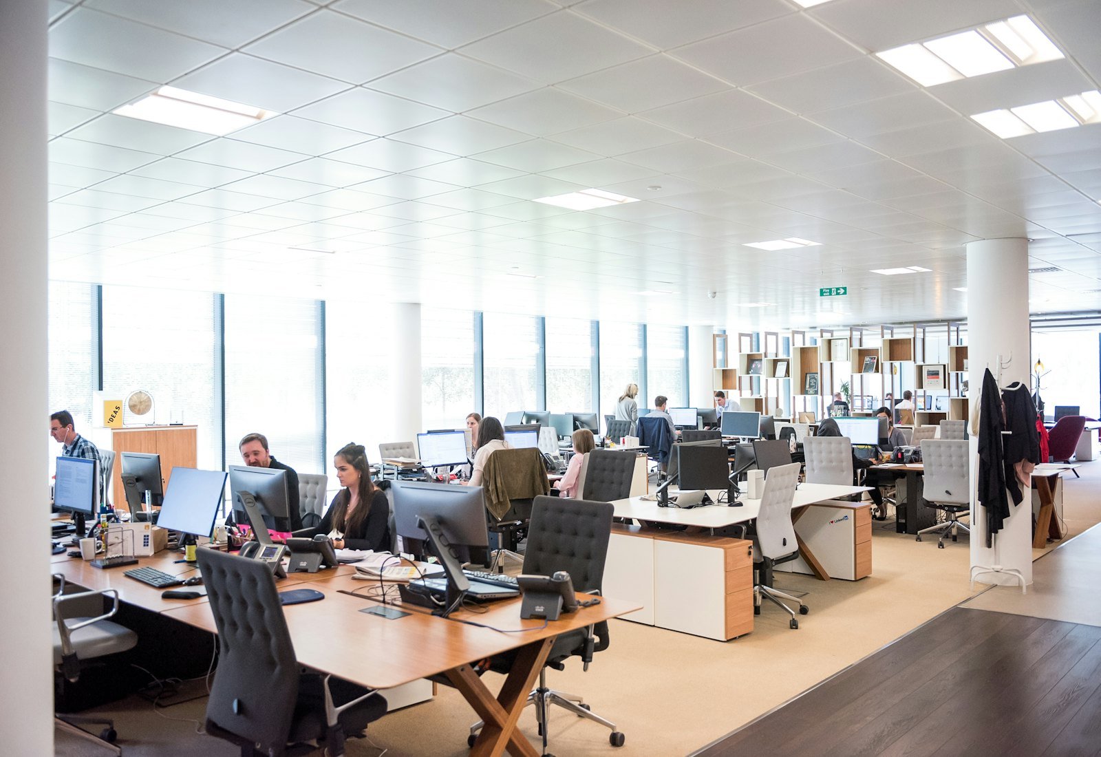 Enterprise office floor where agents handle live customer conversations